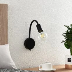 Lindby Aurina Wandleuchte, E27, Schwarz, Schalter 11 Lindby Aurina Wandleuchte, E27, Schwarz, Schalter -Lampen Welt 9626858 2